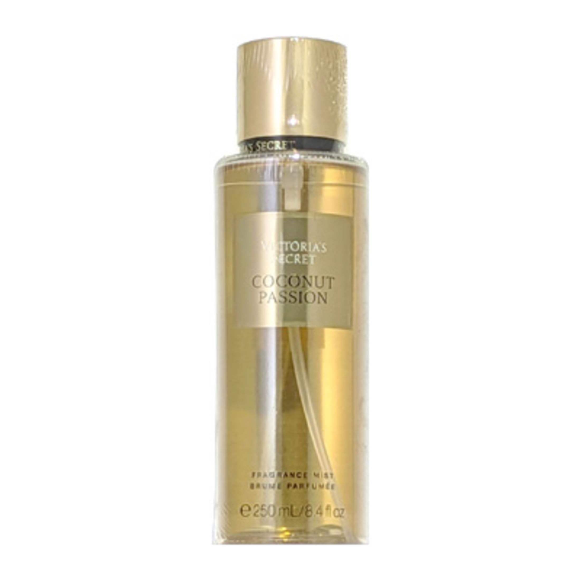 Botella de body mist Victoria's Secret Coconut Passion de 250 ml sobre fondo blanco, vista lateral.