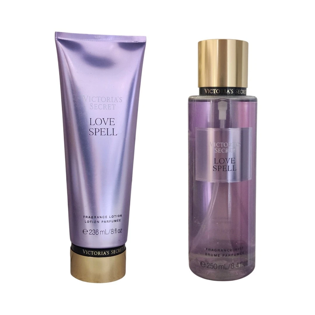 Body mist y loción corporal Victoria's Secret Love Spell sobre fondo blanco.